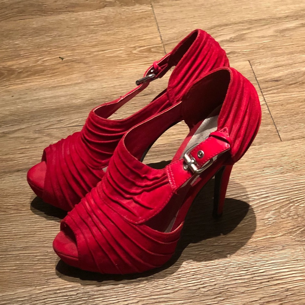 Red open toe pumps